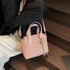 Bolso de diseño de nicho para mujer, nuevo bolso de mano sencillo con texto, bolso cruzado de hombro de gran capacidad para viajes diarios, 2025