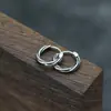 Nuevos pendientes de acero inoxidable de moda transfronterizos, hebilla de oreja redonda de cuerda retorcida creativa, pendientes de personalidad callejeros de moda para hombre, venta al por mayor