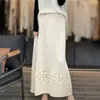 Saia Longa de Lã de Cintura Alta Crochê para Mulheres, Nova Moda Coreana Inverno 2026 Saia com Barra Larga Vazada, Saia Evasê Fluida