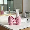 Soporte para cepillos de dientes con forma de lazo Sin instalación Plástico Soporte de almacenamiento Baño Dormitorio Tipo bolígrafo Soporte de exhibición para cepillos de dientes