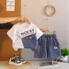 Moderna Ropa de Verano para Niños 2026 Nuevo Estilo Conjunto de Dos Piezas de Manga Corta para Niños Ropa Transpirable de Verano para Bebé Moderna y Elegante
