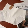 Blanco puro, Grado A, algodón sin blanquear, tiro medio, bragas de triángulo sin costuras, diseño simple y elegante, refuerzo antibacteriano 7A, ropa interior femenina transpirable y amigable con la piel