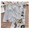 Pijama Hongda Sheng de Seda Hielo Acanalado con Copas para Mujer Manga Corta Pantalón Largo Nuevo Gato de Dibujos Animados Estilo Perezoso Hogar