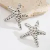 Pendientes Exagerados de Aleación Metálica de Girasol y Estrella de Mar de Venta Caliente Transfronteriza para Mujer Moda Sencilla Serie Oceánica Pendientes de Vacaciones