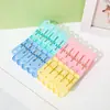 Clip de plástico multifuncional directo de fábrica, clip a prueba de viento para secar, clip pequeño fijo para ropa, pantalones, calcetines, venta al por mayor
