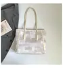 Bolsa Tote de Brim Lavado Grande Capacidade para Mulheres 2026 Nova Bolsa de Ombro para o Trabalho Bolsa de Mão Versátil de Alta Qualidade