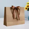Saco de presente de arco saco de embalagem de roupas saco de cosméticos atacado saco de compras fita cor sacola logotipo