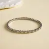 Pulsera Geométrica Redonda de Circón Simple Europea y Americana Chapada en Oro Real de 18K Pulsera Versátil de Nicho Joyería de Mano de Alto Temperamento