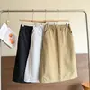 Nuevo estilo de principios de otoño, forro polar cálido, cortavientos, línea A, falda larga blanca versátil para ir al trabajo 13405