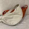 Bolsa transversal feminina estilo urbano simples, bolsa de nylon estilo dumpling Xiaohongshu, bolsa de ombro para estudantes, bolsa de tecido, fornecimento direto da fábrica