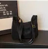 Bolsa de Ombro Grande Capacidade para Mulheres 2025 Inverno Novo Estilo Simples Nicho Bolsa Tote Moda Tendência Bolsa de Ombro Único Transversal