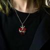 Collar con colgante de alas de amor de aceite de gota Joker de moda hip-hop nicho de alta gama europeo y americano para mujer, outlet de fábrica