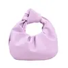 Bolsa rosa de mano, estilo coreano, sensación de alta gama, bolso tipo cubo versátil, diseño de nicho ultrasuave, bolso de mano pequeño, bolso nube versátil