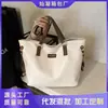 Bolsa de Mano Transfronteriza para Mujer 2025 Otoño Nuevo Bolso Tote Grande de Gran Capacidad Bolso de Hombro Cruzado Estilo Coreano Moderno Bolso para Viajes