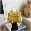 Bolsa Kelly de Mão Popular Atacado Estilo Coreano Fashionável para Mulheres no Trajeto para o Trabalho Bolsa Transversal de Luxo Leve Textura de Alta Qualidade
