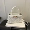 2026 Verano Nueva Moda Elegante y Única Simple con Estilo Texturizado Moderna Versátil Bolso Pequeño Cuadrado de Hombro Cruzado de Mano