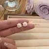Pendientes pequeños frescos de aguja de plata 925 azul Mori blanco temperamento simple moda corazón de niña pendientes de flor venta al por mayor mujer