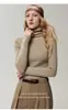 Suéter de punto de cuello alto estilo nuevo 100% cachemir Bai Cai Rong otoño/invierno 2026 nuevo jersey básico de punto acanalado ajustado