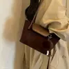 Nuevo bolso de hombro de moda de gamuza y terciopelo para mujer 2026, estilo coreano, vintage, de axila, otoño, exquisito, conjunto madre-hija