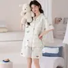 En stock pijamas de nuevo estilo 2026 para mujer, algodón, verano, manga corta, pantalón corto, cárdigan, solapa, de dibujos animados, se pueden usar fuera de casa, ropa para el hogar