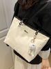 Bolsas Tote da Moda Deste Ano 2026 Outono/Inverno Moda Versátil Bolsa de Ombro de Mão para Mulheres Nicho Versátil Bolsa de Compras