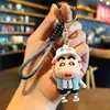 Super fofo lápis de cor pequeno novo boneco tridimensional carro chaveiro anti-perda pingente barraca de feira noturna presente de impulso