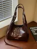Bolso tote retro para mujer, nueva colección otoño/invierno 2026, bolso de axila de alta gama, bolso de hombro para el trabajo, bolso cruzado tipo cubo versátil