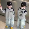 Camiseta de manga larga para niño, nueva 2026 primavera y otoño, camiseta básica de algodón puro, top casual coreano de cuello redondo para bebé niño