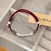Pulsera Trenzada de Cuerda Roja Estilo Chino Retro Estilo Étnico Cuerda Roja Joyería del Año del Zodiaco para Mujer Venta al por Mayor