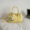 Bolso de Mano de Diseño de Moda de Nicho para Mujer 2026 Nuevo Estilo Coreano Bolso Cubo para Viajes Diarios Bolso de Hombro Único Cruzado Transfronterizo