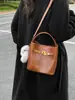 Bolso de Mano de Comercio Exterior Bolso Cubo para Mujer Moda Nueva Otoño e Invierno Bolso de Hombro para Viajes de Negocios Bolso Cruzado Retro de Alta Gama