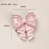 Accesorios de resina para manualidades de dibujos animados: lazo de lunares café con leche, pinza para el pelo de pegamento color crema, funda para teléfono, hebilla de zapato, llavero