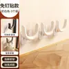 Estante para pantuflas de baño, tipo ventosa, montado en la pared sin taladro, especial para baños, modelo nuevo, escurridor con ganchos y estante de almacenamiento