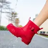 Botas de lluvia cortas populares transfronterizas para mujer, sencillas y elegantes, impermeables y antideslizantes, botas de lluvia de moda para exteriores con suela blanda para mujer