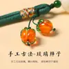 Colgante para teléfono móvil de caqui Ruyi, cordón corto para la muñeca, colgante de caqui de cristal para hombres y mujeres, llavero, accesorio de cuerda antipérdida