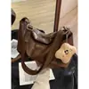 Bolsa Feminina de Grande Capacidade Outono 2026 Nova Moda Design de Nicho Ombro Único Popular Bolsa Dumpling Transversal
