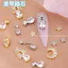 Popular en línea popular joyería para uñas chapada en oro circonita gota de agua joyería para uñas de alta gama exquisita estrella Luna diamante para uñas al por mayor