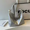 Bolsa Feminina de Grande Capacidade, Versátil para a Primavera de 2026, Nova Bolsa de Ombro Simples com Design Texturizado, Adequada para a Faculdade e o Trabalho