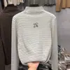 Ropa interior térmica de forro polar para niñas Otoño Invierno 2026 Nuevo estilo Ropa interior para niños y bebés Camiseta de manga larga Top cálido a rayas