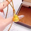 Nuevo Colgante Sachet Abrible en Espiral con Pedrería Estilo Chino, Colgante Calabaza Gordita, Colgante Cadena para Suéter Dorada Cobre Gordita, Alta Retención de Color
