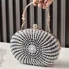 Nova Bolsa de Mão Redonda de Metal com Pérolas e Strass Bordados à Mão Estilo Europeu e Americano Bolsa para Vestido Produto Novo Transfronteiriço Souvenir
