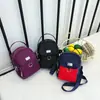 2026 Nova Bolsa Pequena de Lona Verão Mini Bolsa para Celular Transversal Leve Moda Versátil Bolsa de Mão Bolsa de Ombro