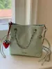 2026 Verano Nuevo Bolso Cubo de Cadena de Rejilla de Diamante Moda Tendencia Elegante y con Estilo para el Trabajo y el Trayecto Bolso de Hombro