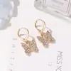 Nuevos pendientes europeos y americanos de moda con forma de mariposa y diamantes, elegantes y elegantes pendientes de mariposa, accesorios de fábrica.