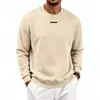 Moletom casual masculino europeu e americano da Amazon, com corte solto, cor sólida, forro de fleece e gola redonda com logo de silicone