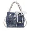 Bolsa Pequena com Textura para o Verão para Mulheres 2025 Nova Bolsa de Ombro Transversal Borboleta Corrente Prateada Bolsa Estilo Balde da Moda