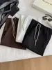 Pantalones jogger de cordón estilo minimalista coreano para mujer, versátiles y adelgazantes, con un tacto relajado, pantalones de pierna ancha con retazos, Otoño 2026