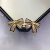 Joyería hecha a mano DIY aretes de perlas, soportes vacíos para aretes de perlas, accesorios, aretes de lazo dibujados a línea, blanco al por mayor