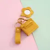 Colgante de Almacenamiento para Bolso Pequeño Estilo Coreano con Espejo Bolsa para Auriculares Llavero Colgante Bolso Mini de Piel Sintética Llavero