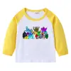 Camiseta infantil de primavera y otoño 2023, nueva camiseta de manga larga con cuello redondo y dibujos animados, camiseta de algodón para bebés y niños.